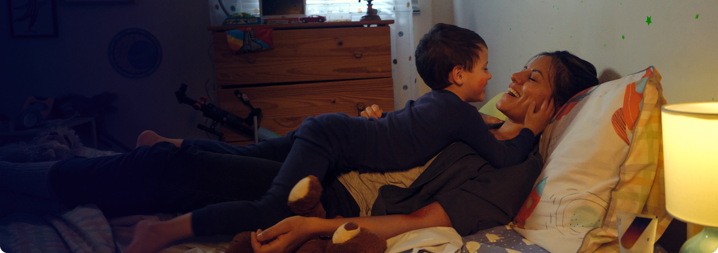 Mom and son laughing together